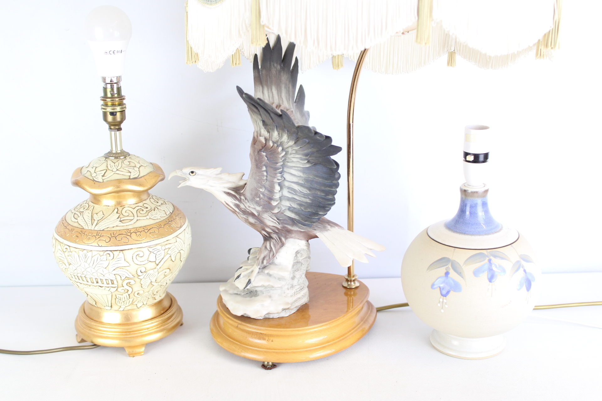 A Trio of Decorative Table Lamps Including a Luigi Fabris Porcelain Eagle
