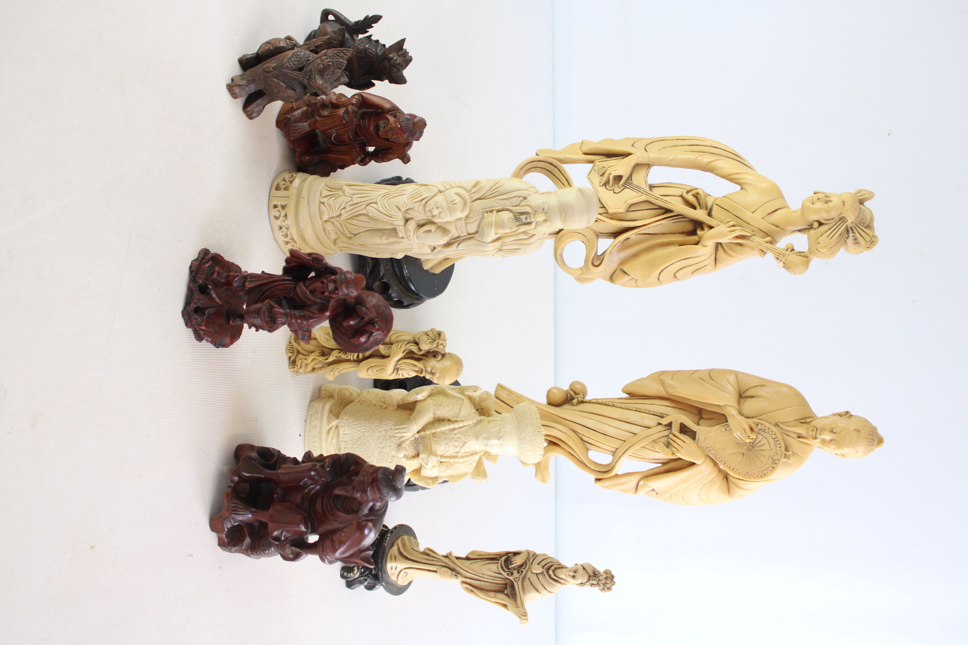 Ten Vintage East Asian-Themed Decorative Resin and Composition Figures