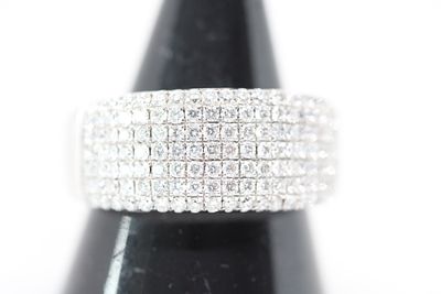A 14 Karat White Gold and Five-Row Diamond Pave Band Ring Weight 6.2g Size O. A wide jewelry 