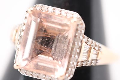 14ct Gold ring set with diamonds & large emerald cut morganite Weight 4g Size S.5. 14ct Gold 
