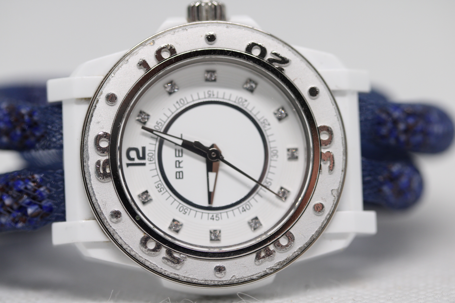 Ladies Breil Quartz Watch with Gemmed Hours Markers on Unusual Strap with Magnetic Clasps.