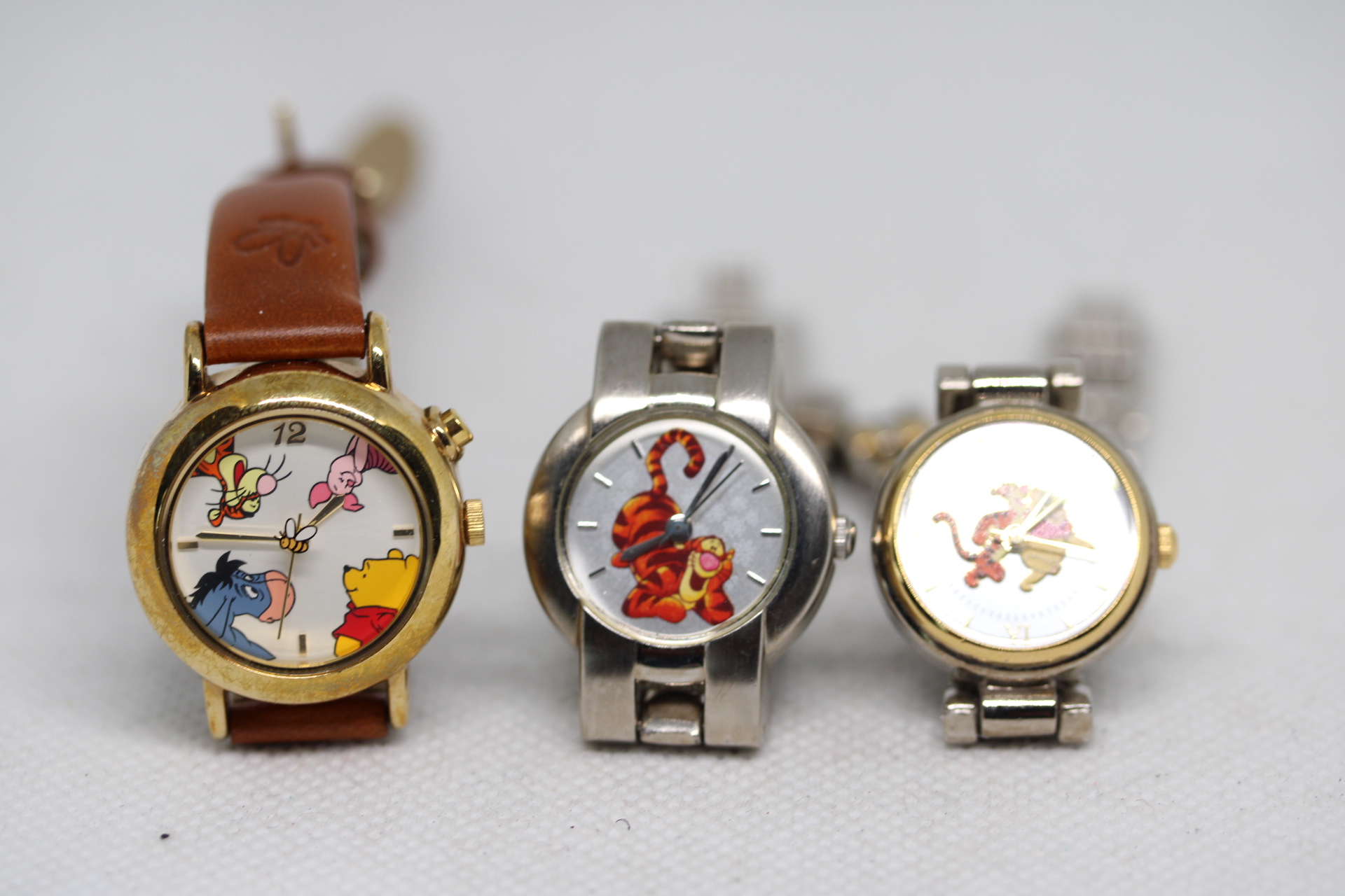 Ladies Genuine Disney Quartz Watches featuring Tigger and Pooh Bear.