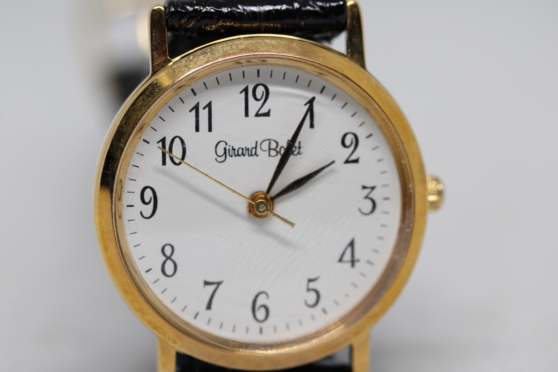 Ladies Girard Bolet Black Leather Gold Plated Dress Watch.