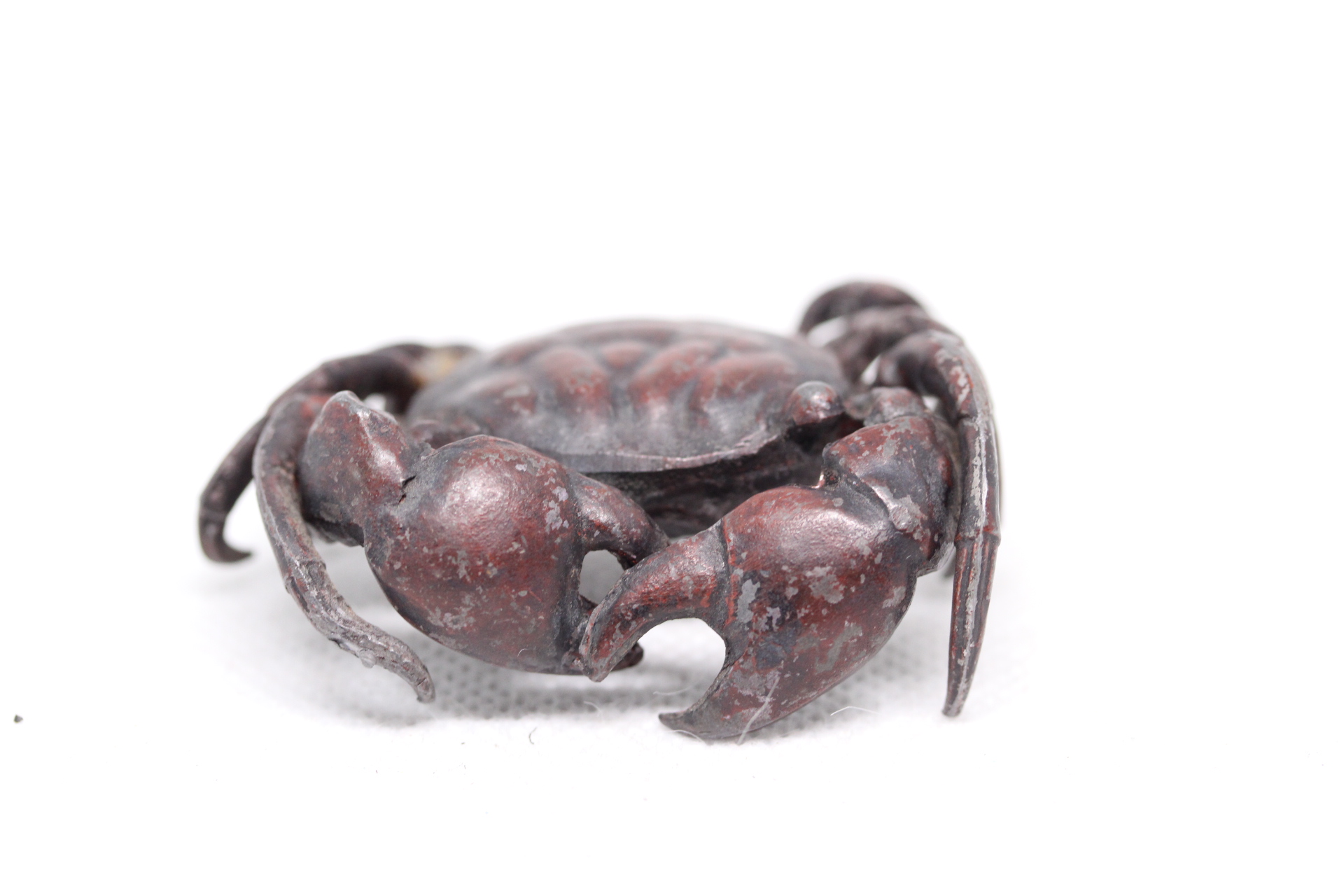 Red Coloured White Metal Crab.