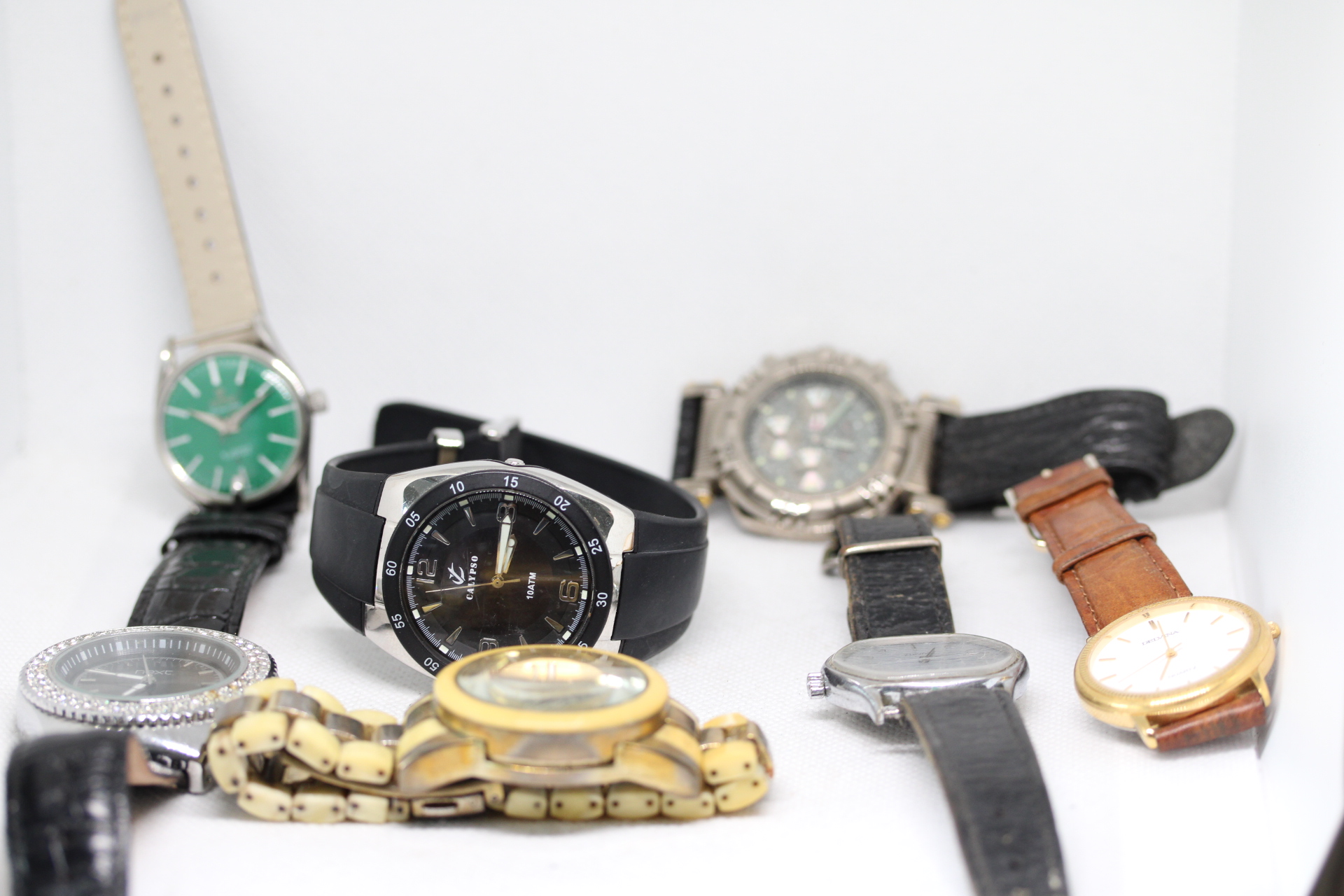 Collection of unsorted wristwatches