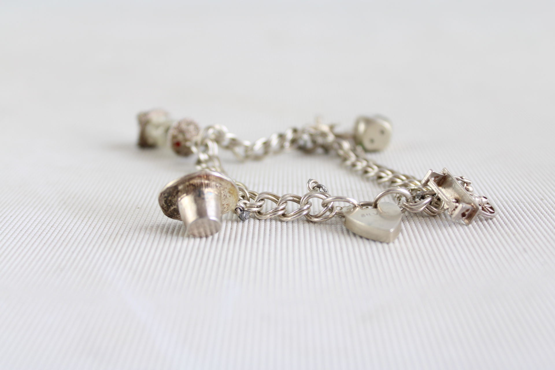 Silver charm bracelet - 5 charms