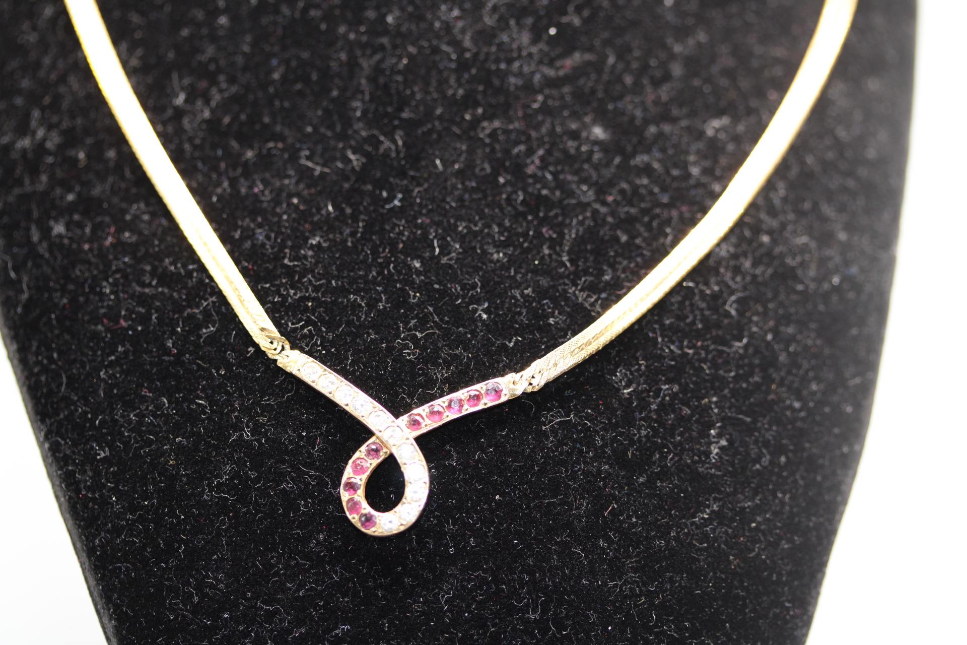 9ct Gold chain & pendant set with white & red stones