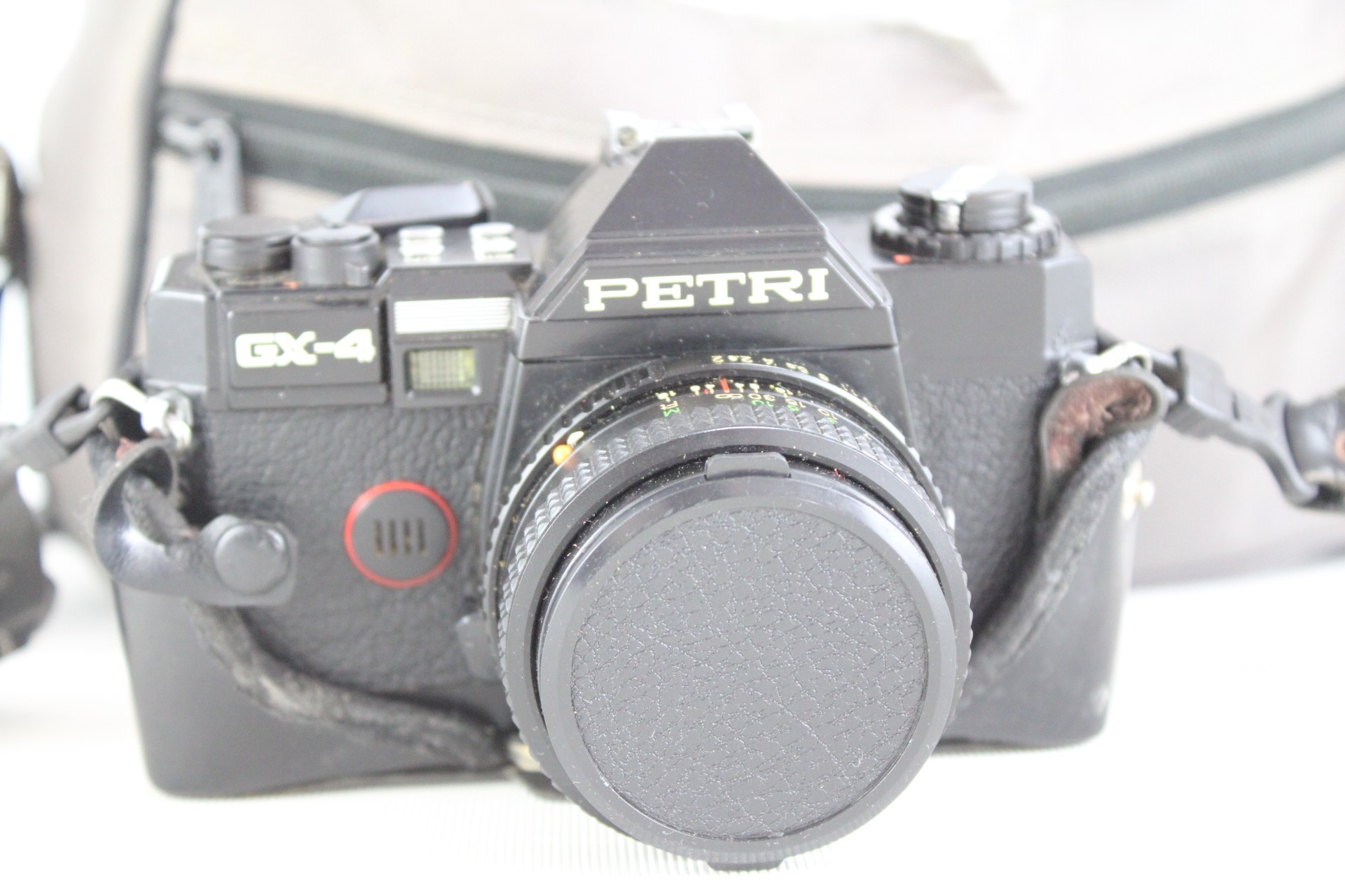 Petri GX-4 35mm SLR Film Camera with f/1.7 Lens and Accessories