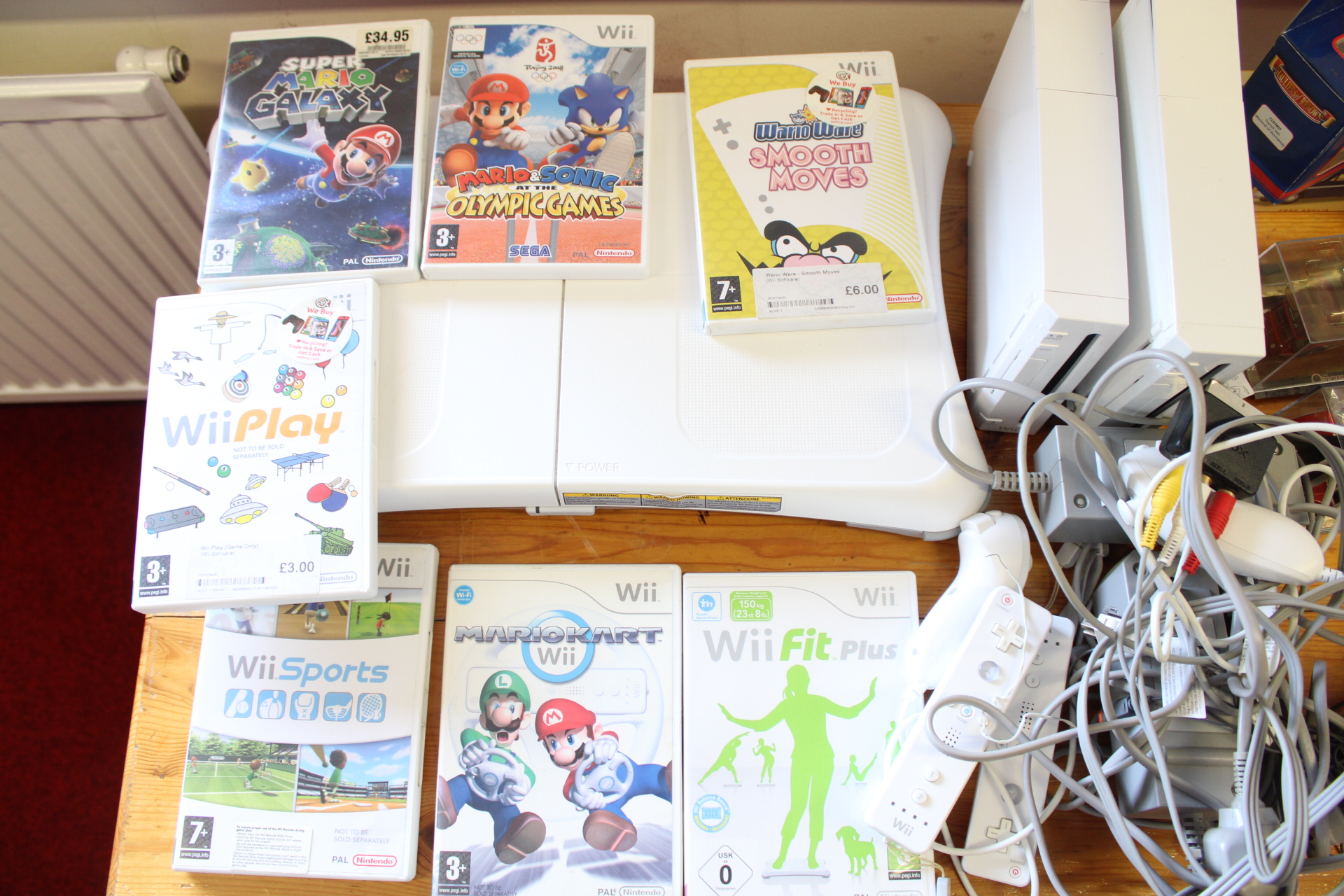 Nintendo Wii Video Game Console Bundle Including Two Consoles Balance Board Accessories and games - 2 cases without discs