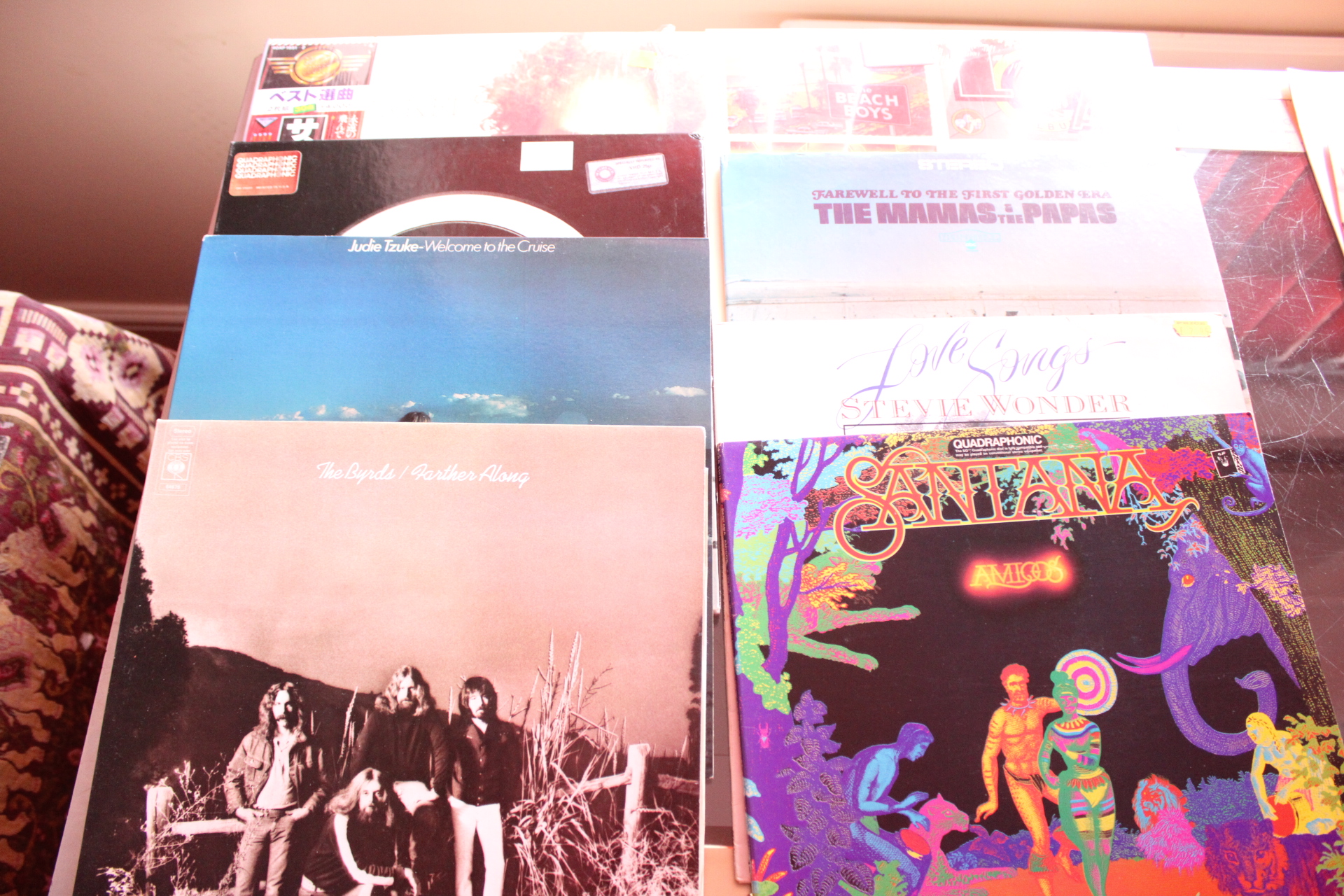 A Collection of Classic Rock and Soul Vinyl LP Records Including Santana and The Byrds