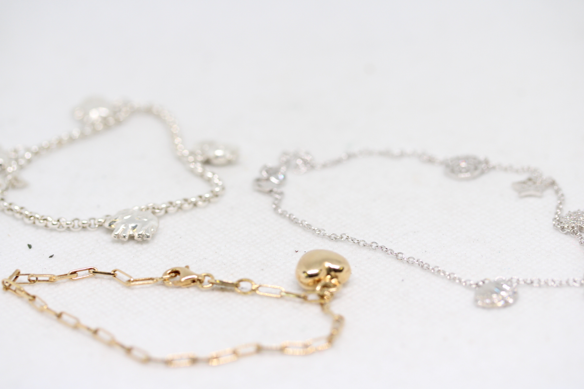 3 Silver bracelets