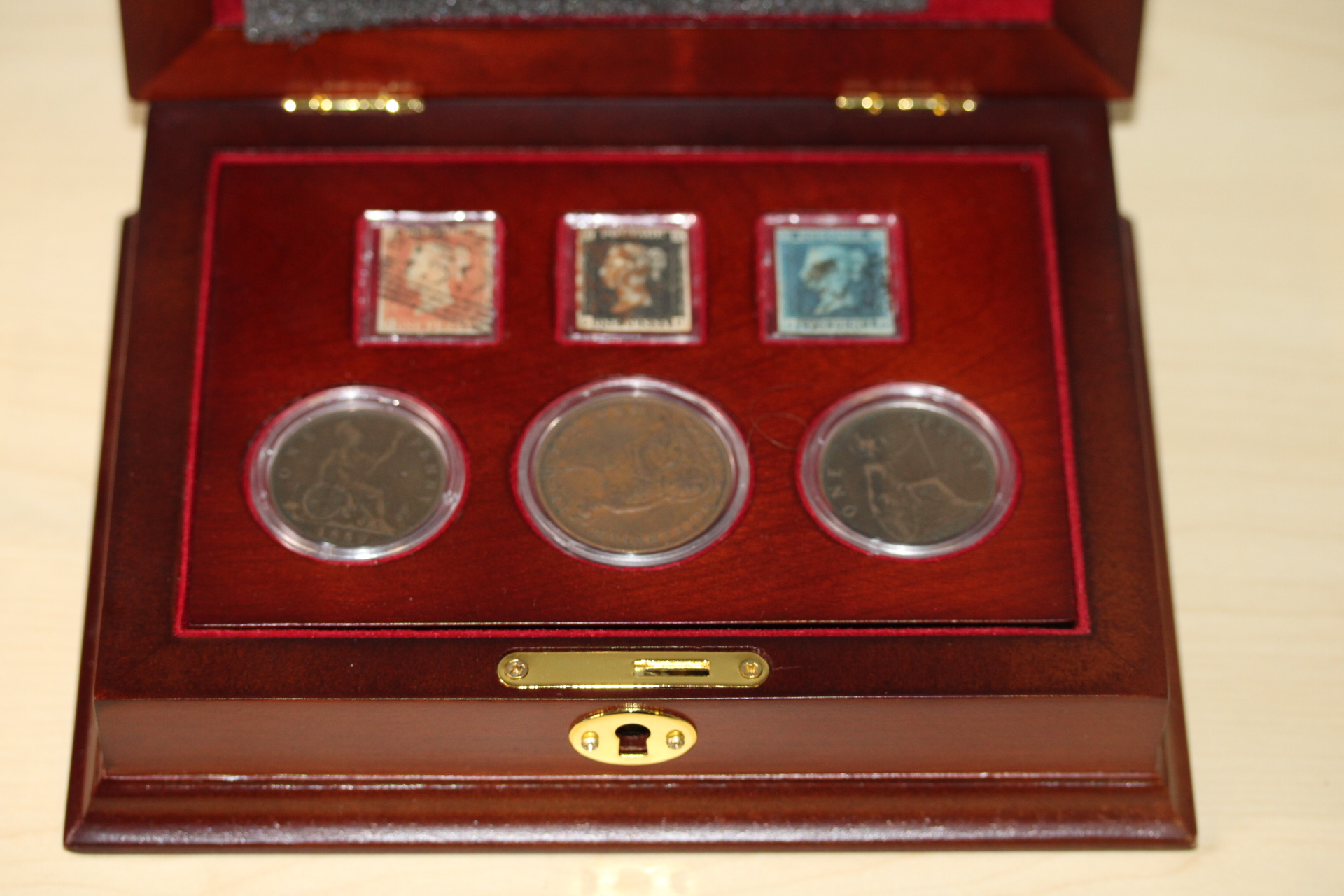 The worlds first postage stamps featuring penny black, penny red & penny blue accompanied  by 3 Victorian circulated pennies in presentation box