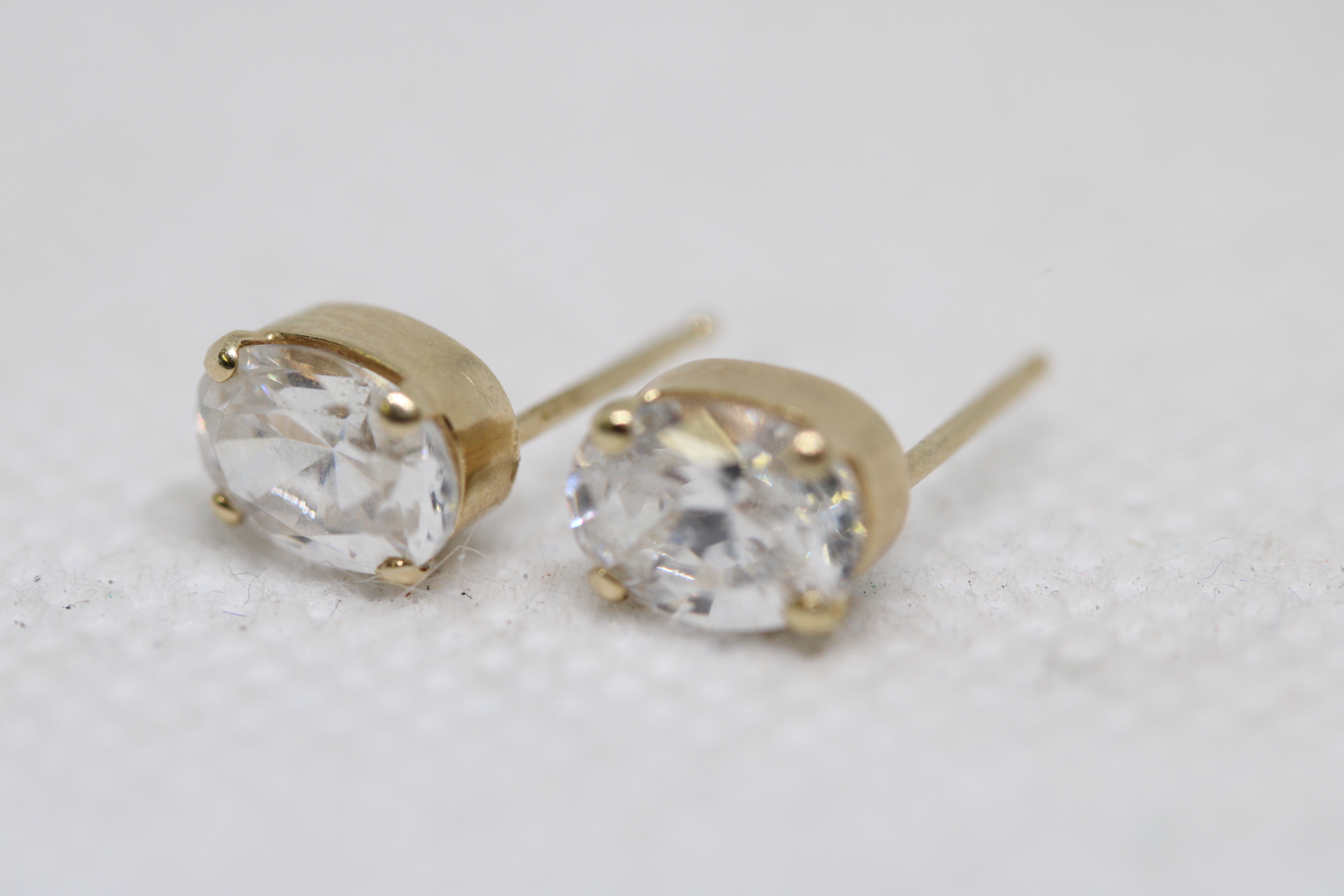 Pair of 14ct Gold earrings set with cz