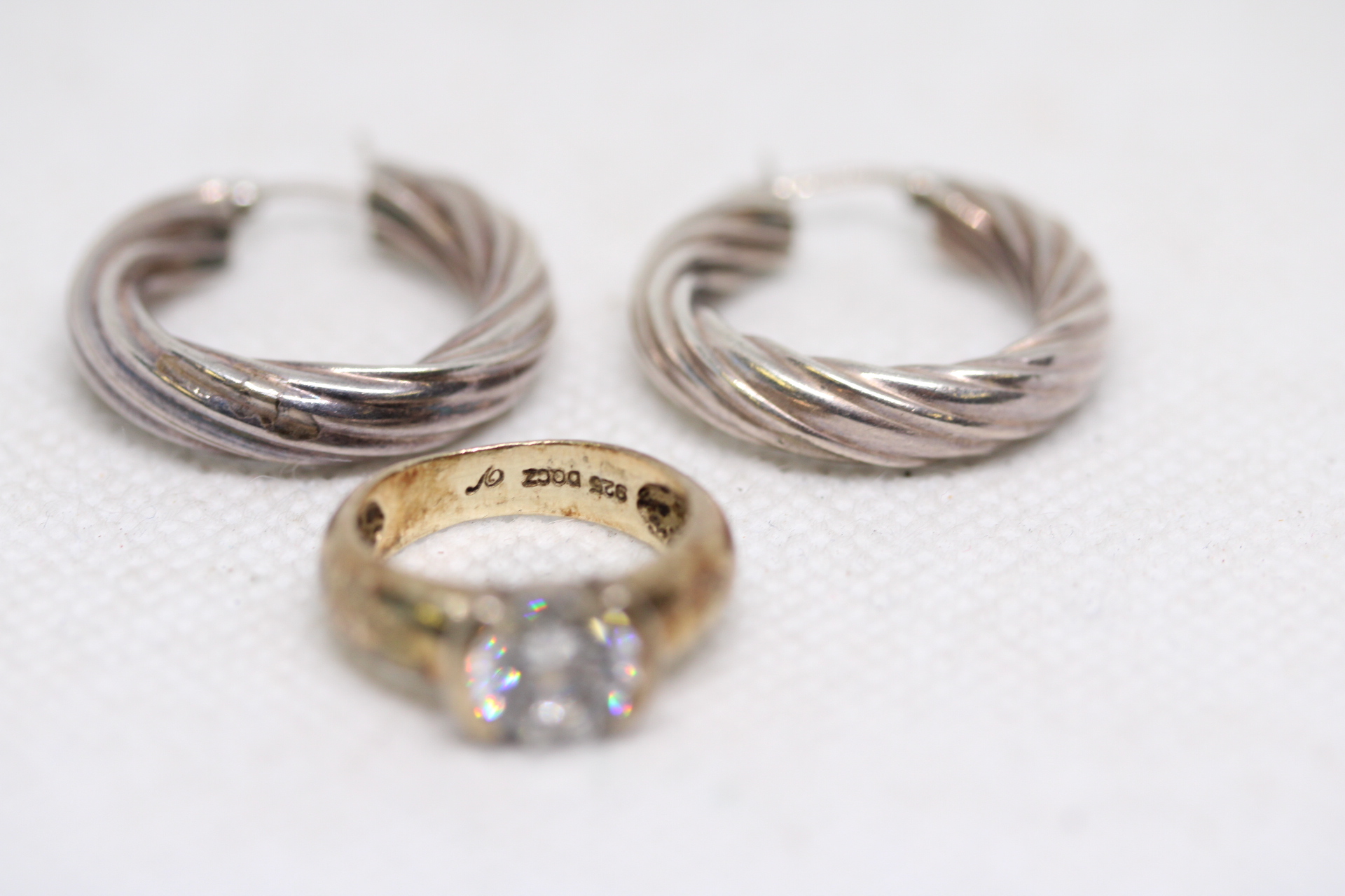 Pair of silver earrings & gold plated silver ring