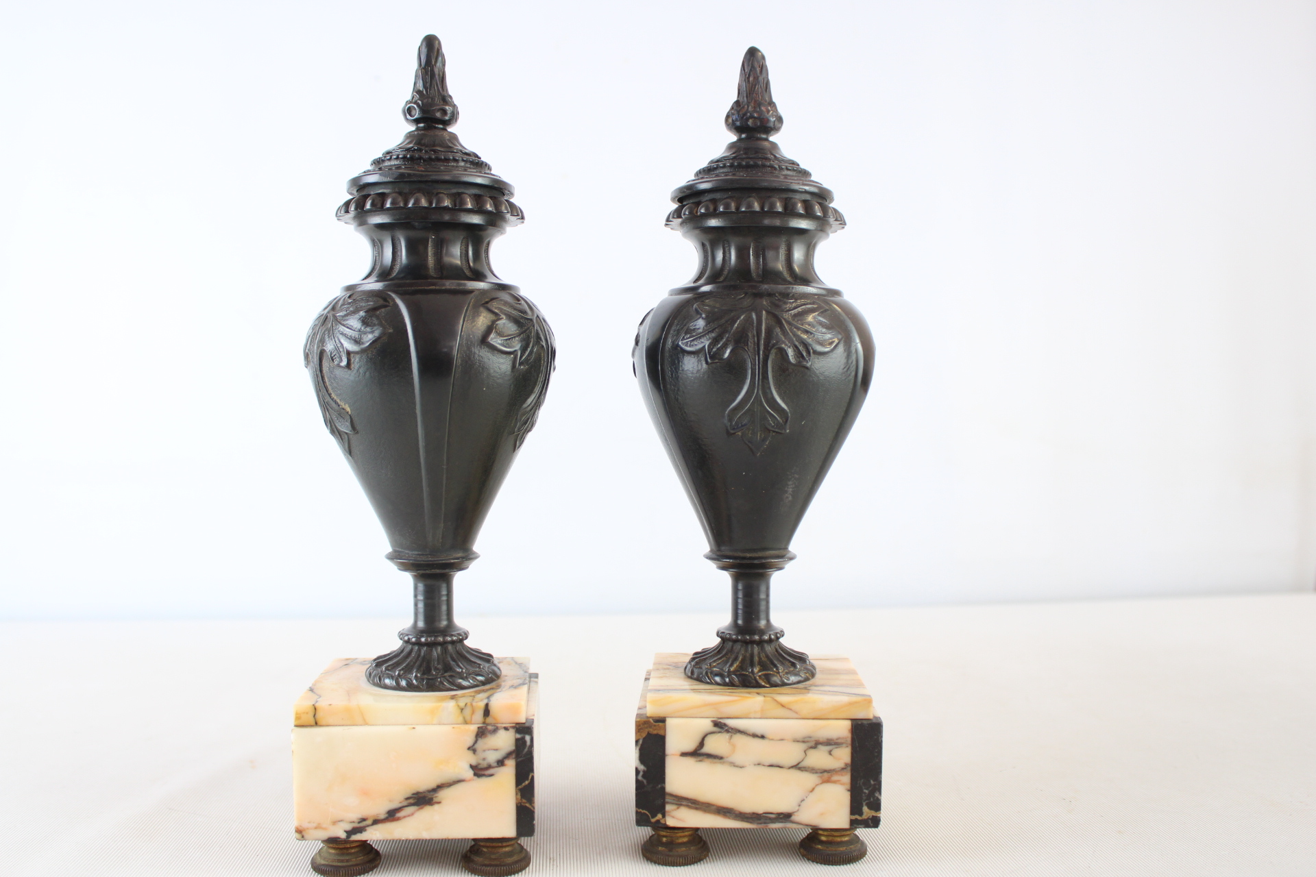 A Pair of Neoclassical Style Patinated Bronze and Marble Urns