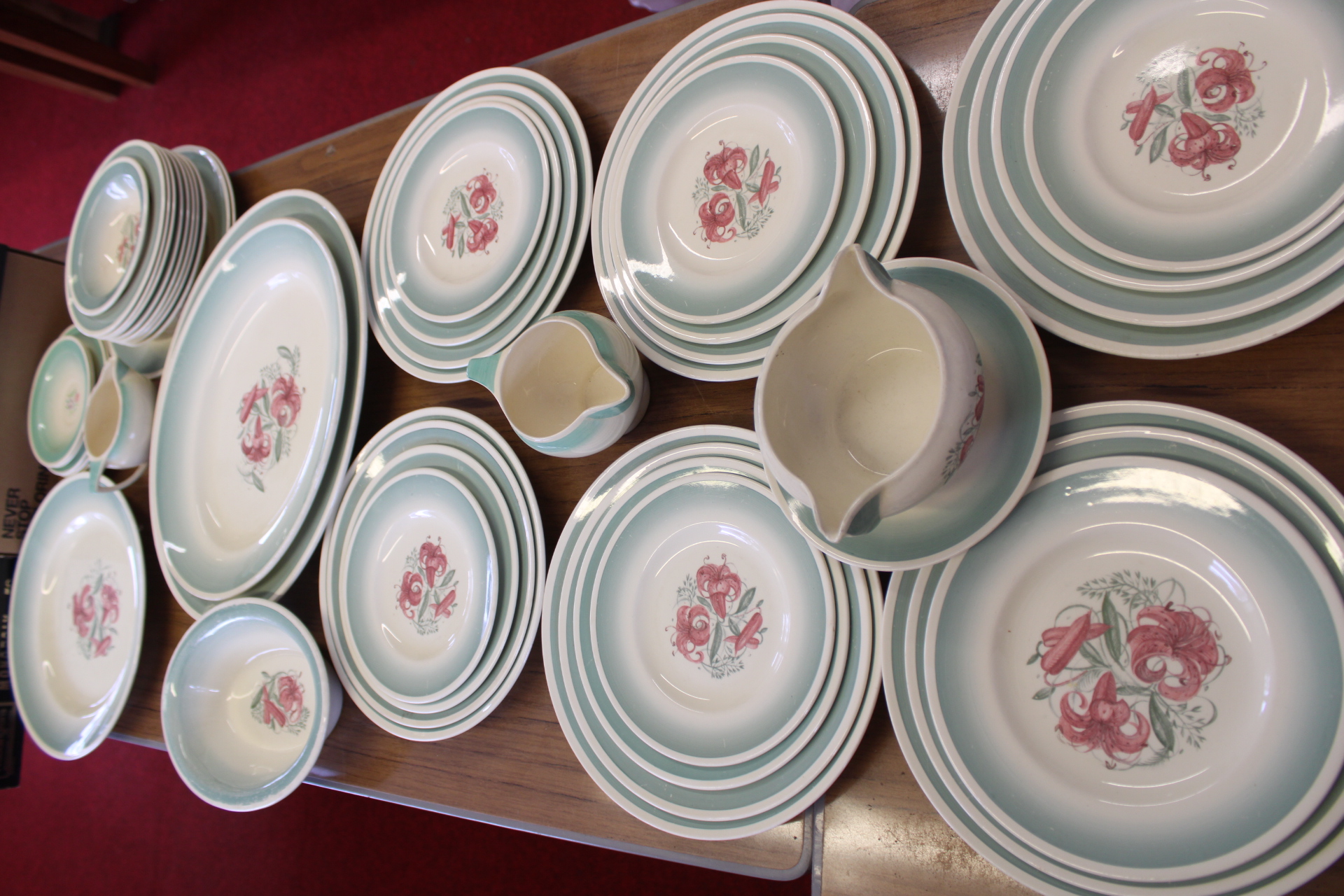 A Susie Cooper Tiger Lily Pattern Partial Earthenware Dinner Service