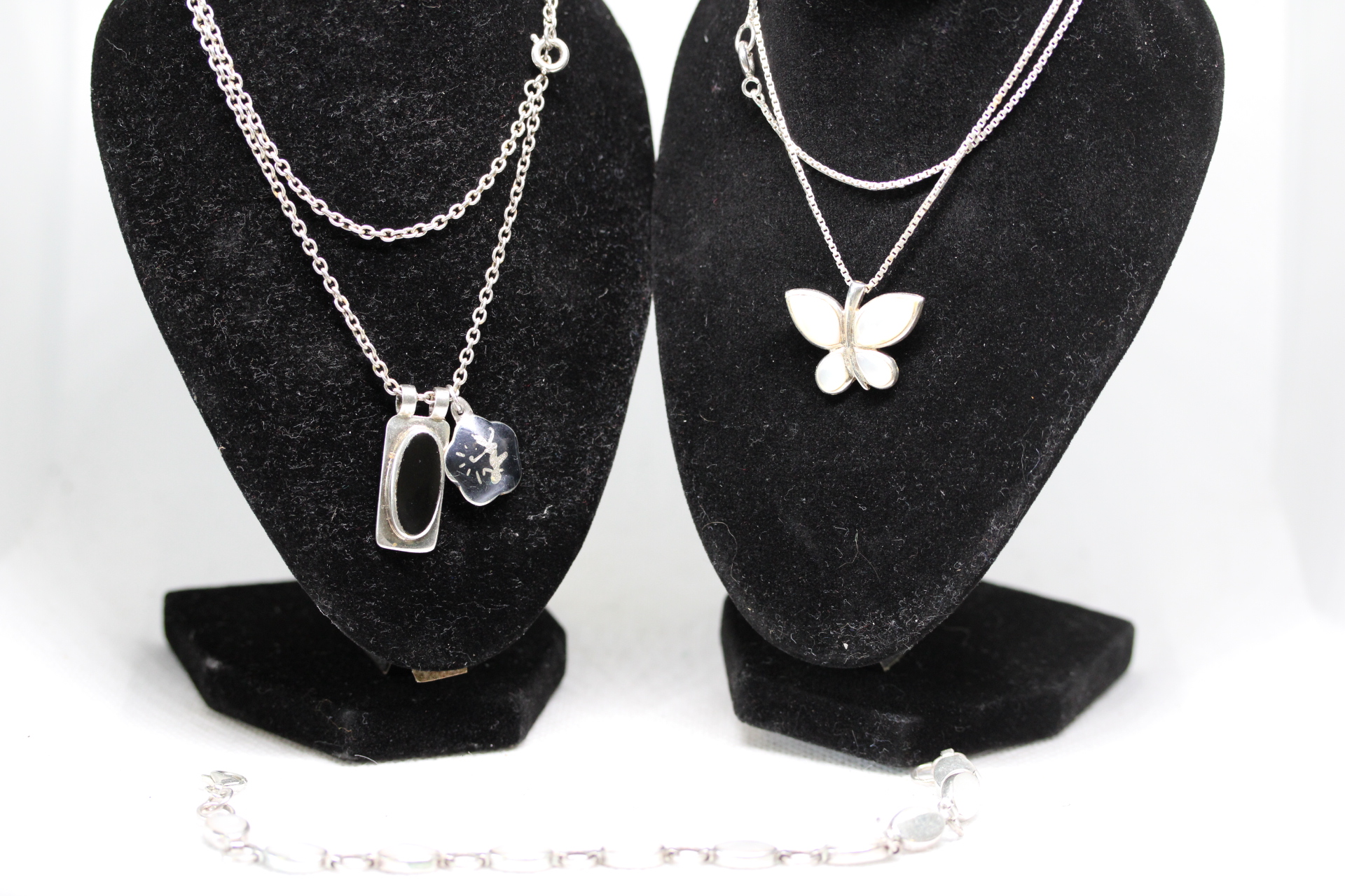 2x Silver chains & pendants together with a silver bracelet