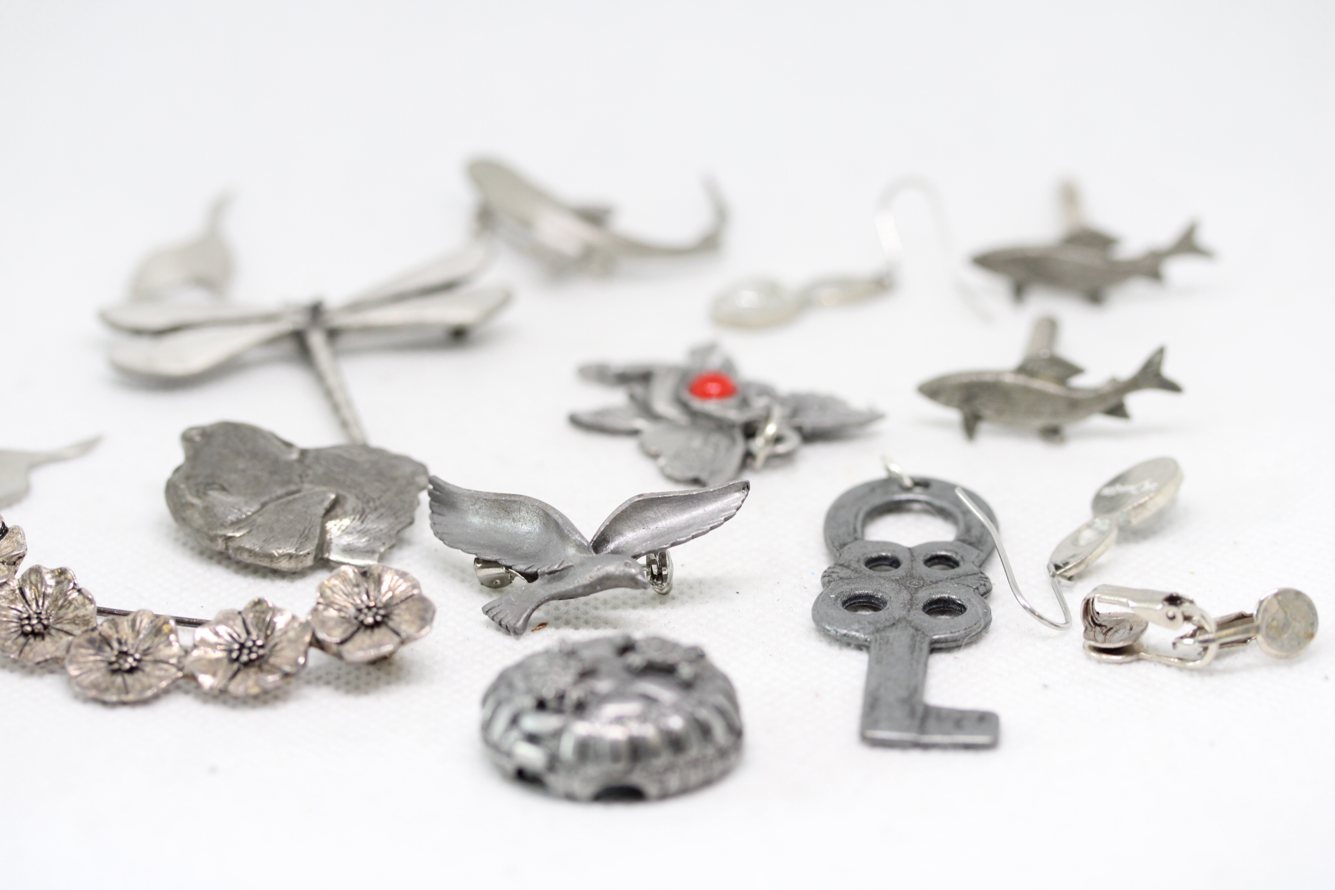 Scandinavian pewter brooches & others