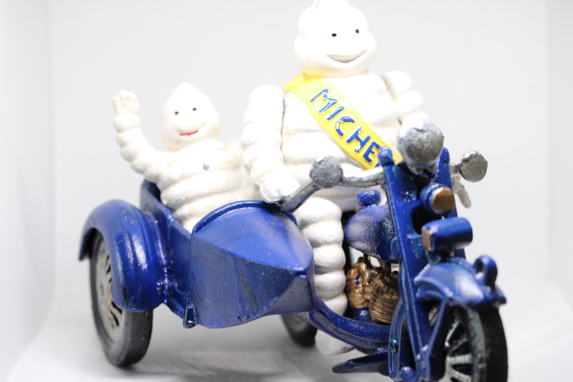 Cast iron Michelin man & sidecar