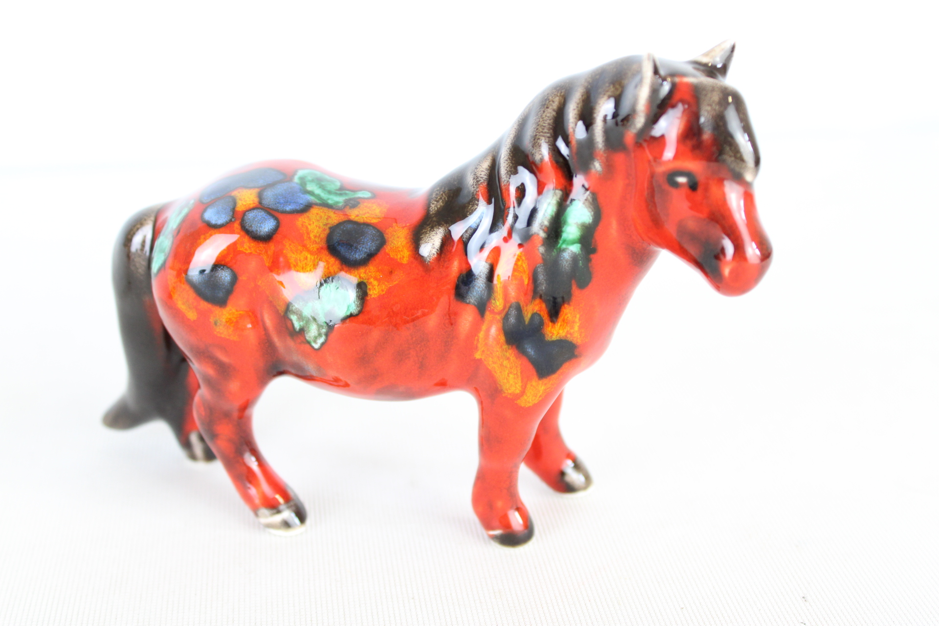 Anita Harris pony signed in gold