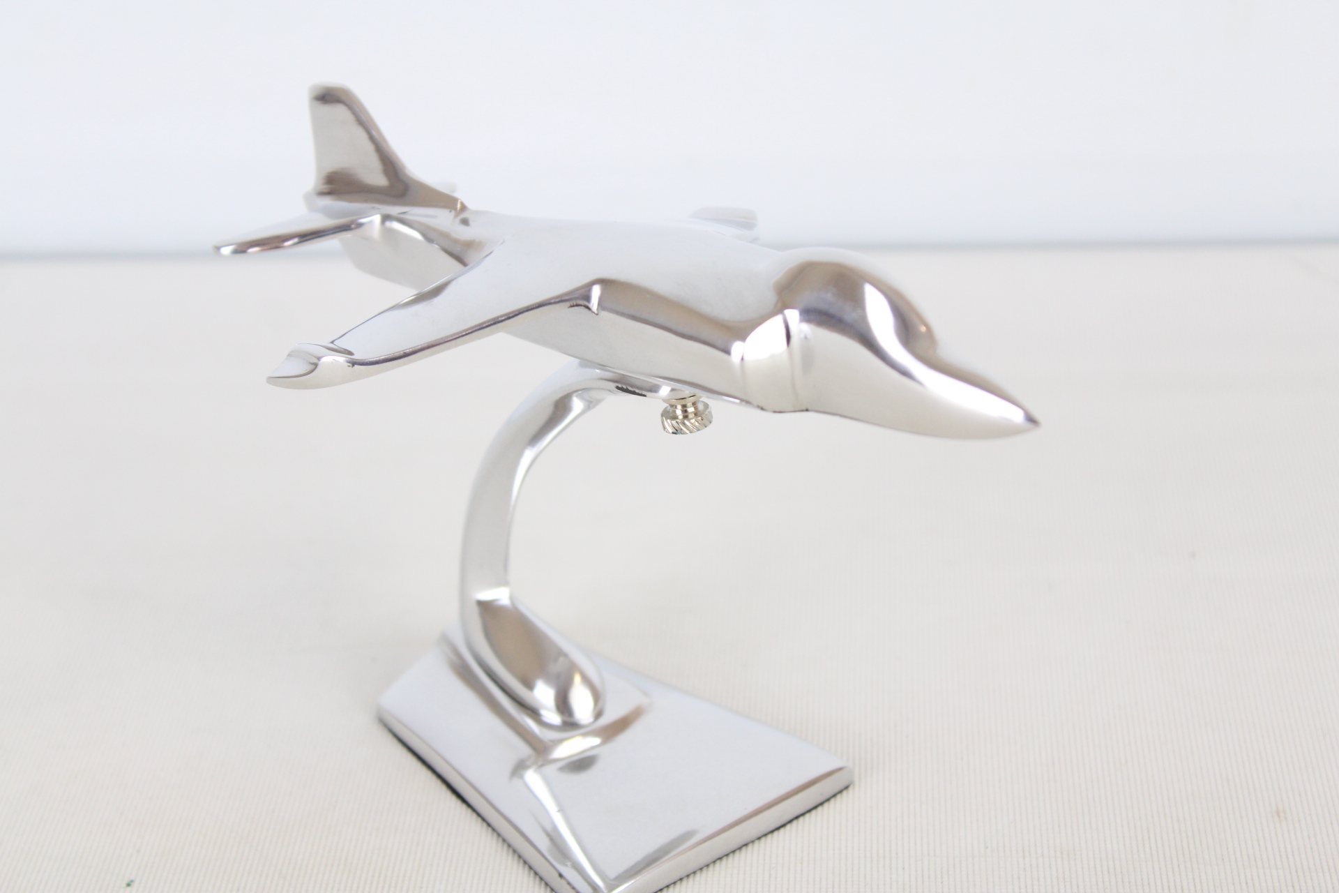 Chrome sea harrier plane on stand