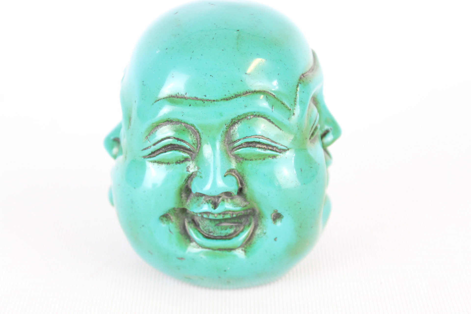 Turqoise 4 faced buddha