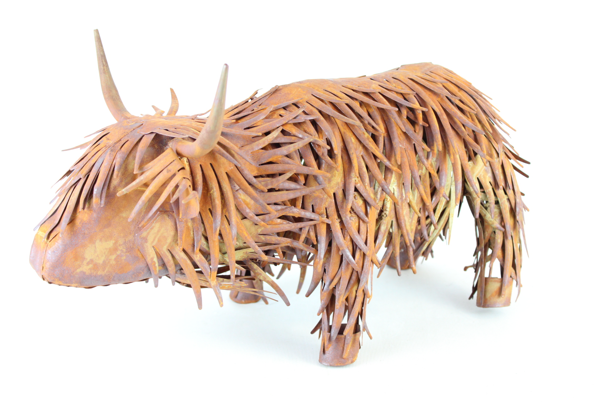 Metal sculpture of a highland cow