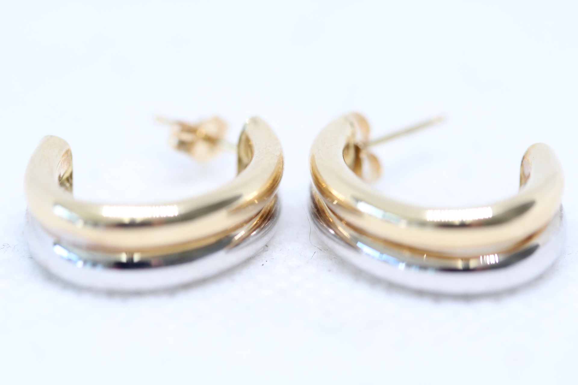 Pair of 14ct Gold dual colour earrings