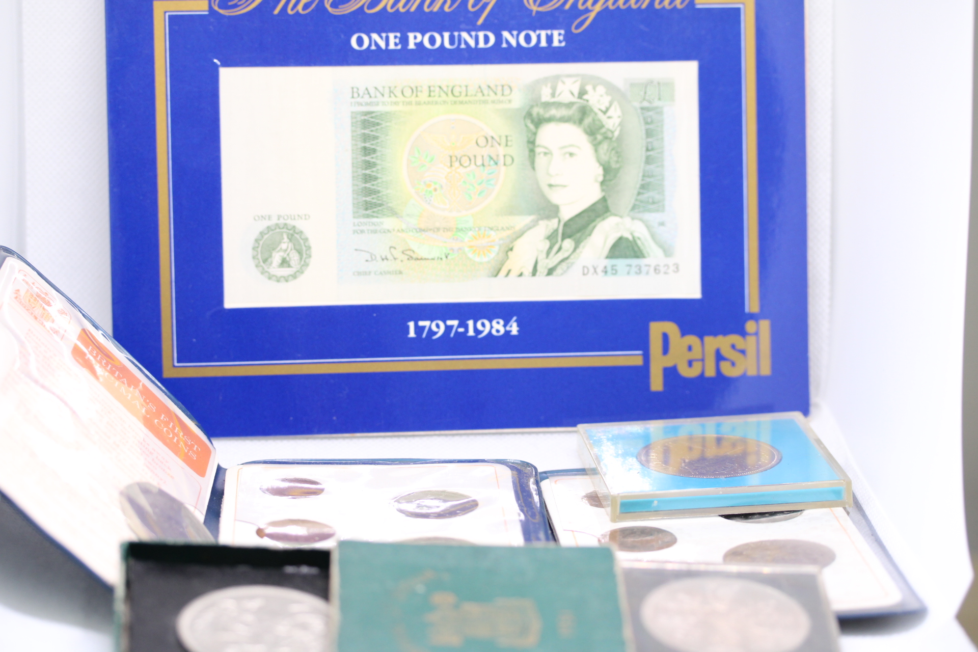 Britain's first decimal coins x2, Bank of England 1 pound note & other commemorative coins