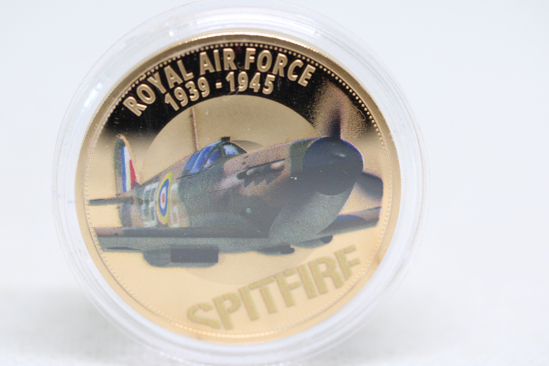 Gold Plated Guernsey 50 pence with coloured Spitfire to Front in Capsule.