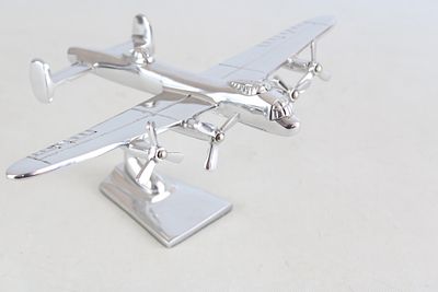 Chrome Lancaster bomber on stand