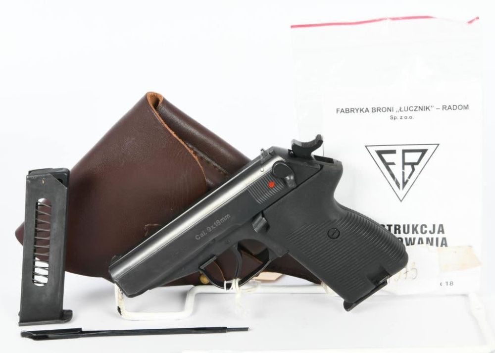 Lot 76: Mint Poland Radom P-83 Semi Auto Pistol 9X18