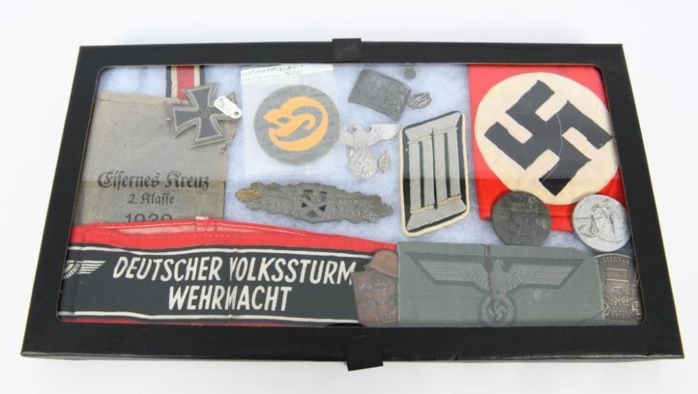 Lot 110: German WWII Authentic Memorbilia -Pins arm bands b
