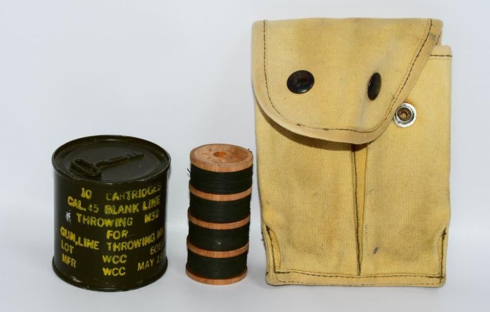 Lot 191: USGI Military Gunline can sealed & wire & Mag pouc