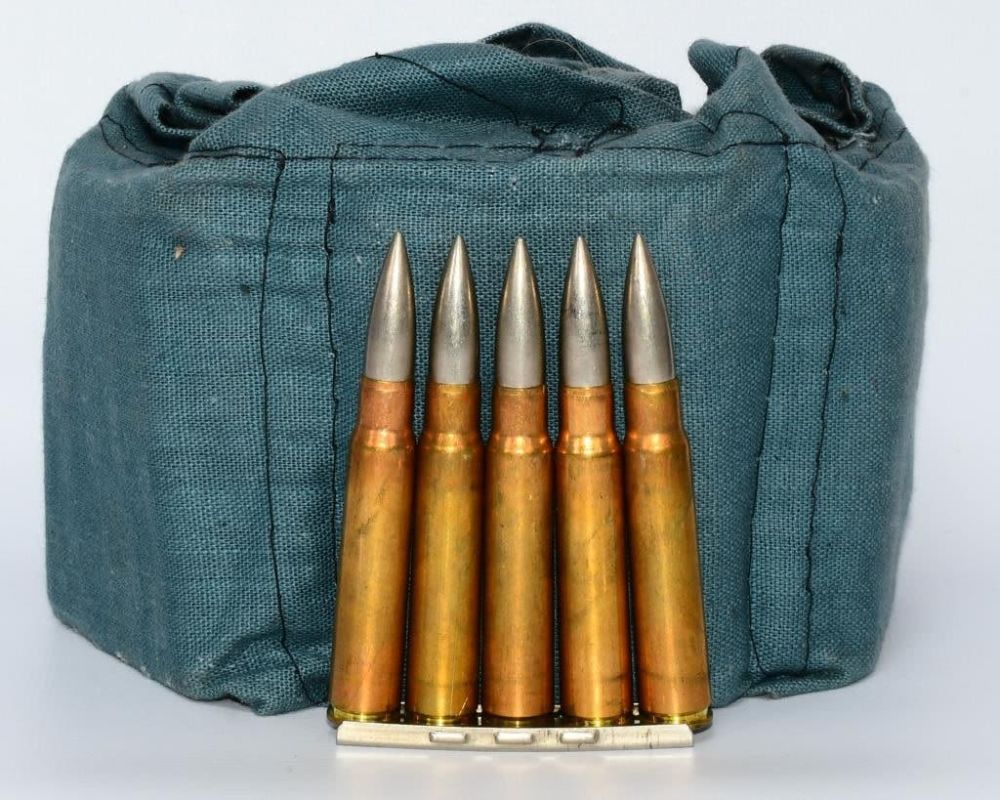Lot 238: 70 Round Bandolier Of 8mm Mauser Ammunition