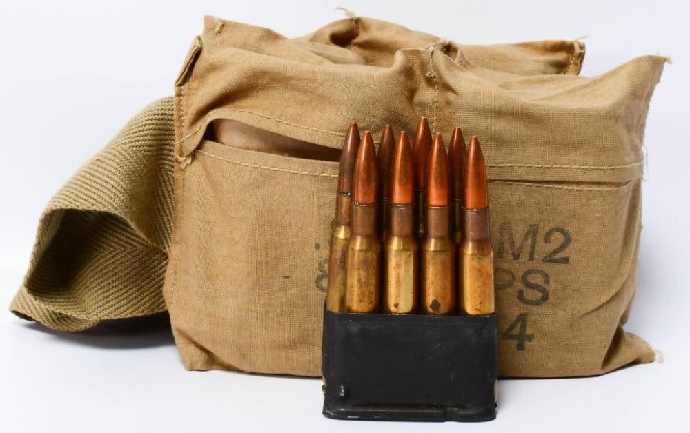 Lot 244: Bandolier of .30-06 on Enbloc Clips 48 Rounds