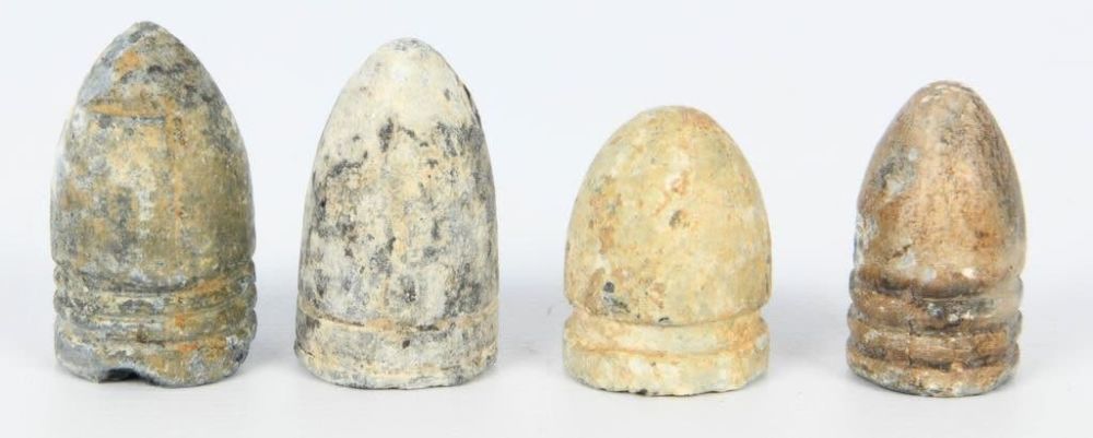 Lot 1097: 4 Rare Antique Collector Percussion Bullets