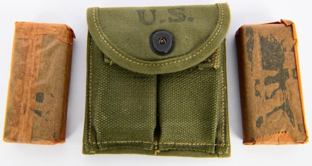 Lot 1337: U.S.G.I. Magazine Pouch W/ 2 M1 .30 Cal Mags