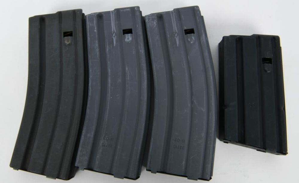 Lot 1163: 3 30 Rd & 1 15 Round Metal .223/5.56 Magazines