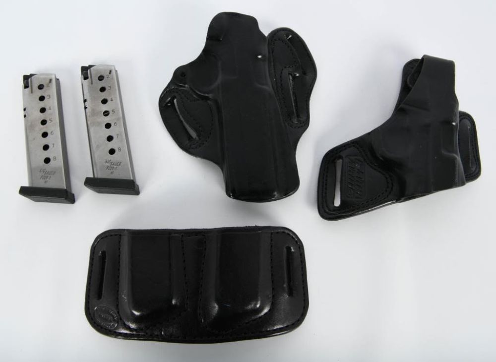 Lot 1175: 2 Sig Sauer P220-1 .45 Cal Mags & Holsters