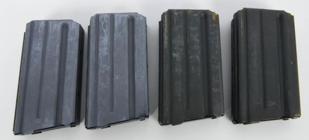 Lot 1805: 4 Factory Colt Marked AR-15 20 Round Magazines
