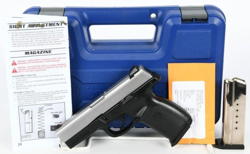 Lot 2100: Smith & Wesson Sigma SW9VE Semi Auto 9MM