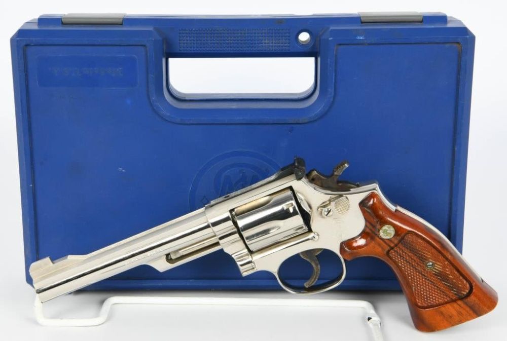 Lot 243: Nickel Smith & Wesson Model 19-5 Revolver .357 Mag