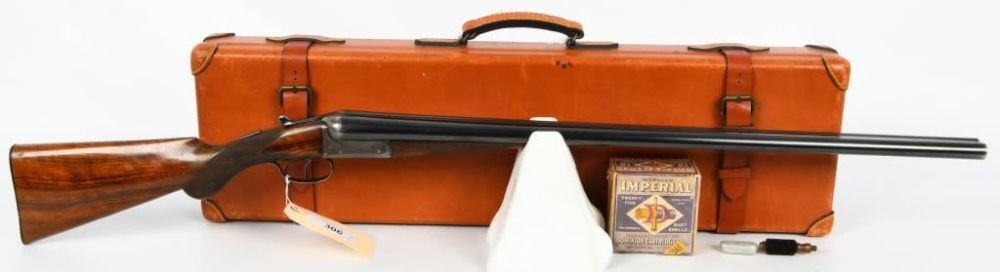Lot 306: Cased and Engraved T. Beard Side by Side Shotgun