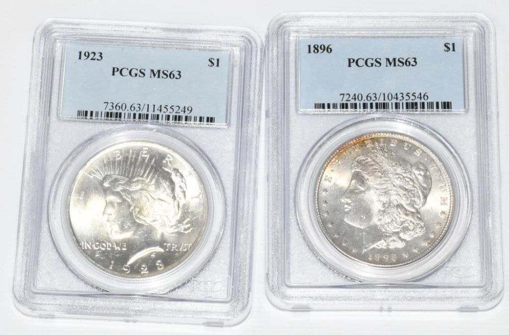 Lot 410: 2 PCGS Graded Coins Peace Dollar & Morgan Dollar