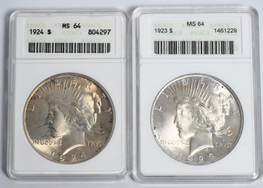 Lot 1100: 2 ANACS Graded Liberty Peace Silver Dollar Coins