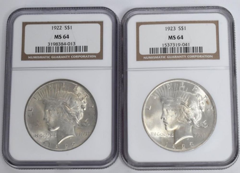 Lot 1172: 2 NGC Graded Liberty Peace Silver Dollar Coins
