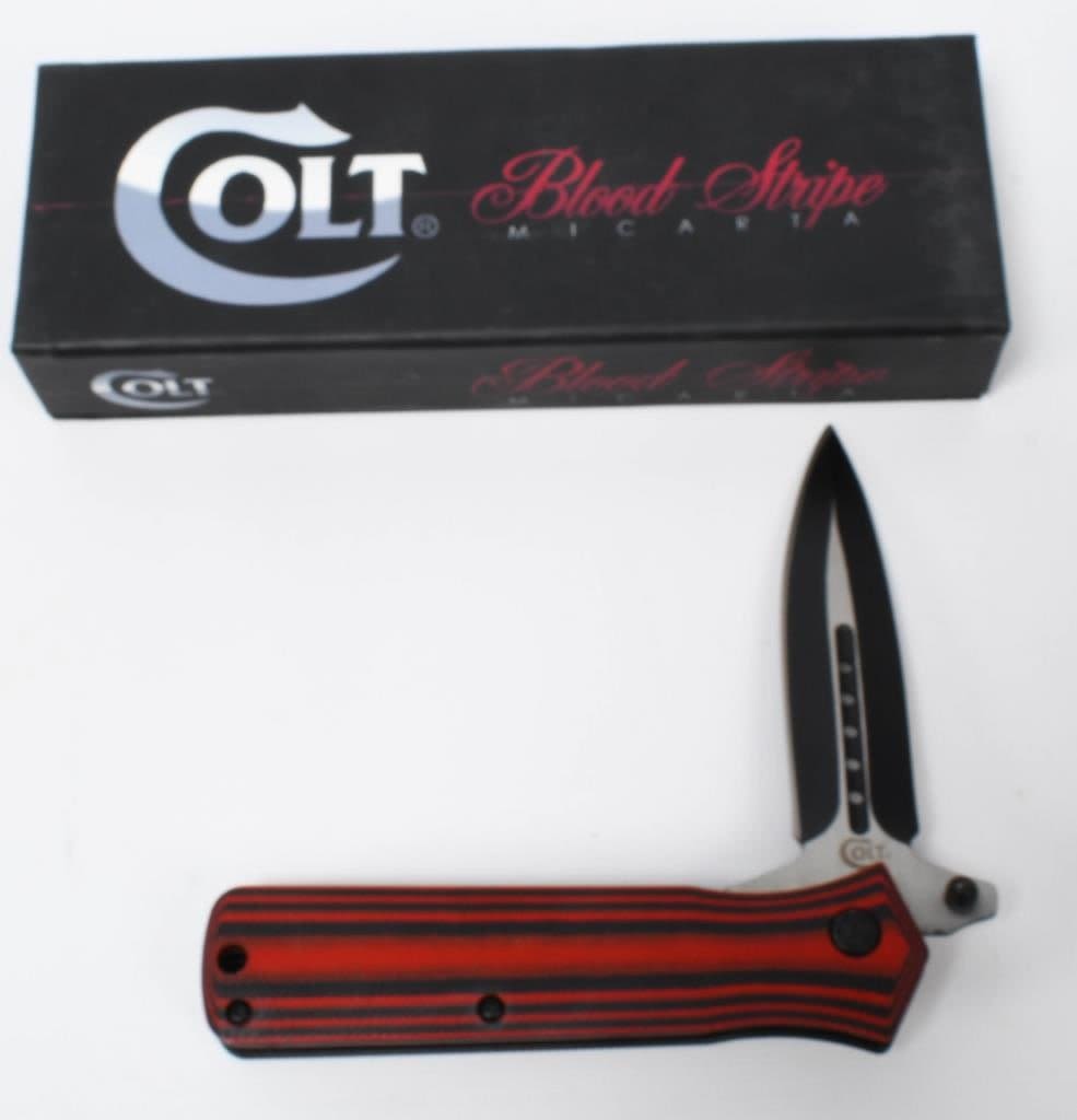 Lot 1187: Colt Blood Stripe Micarta Folding Knife