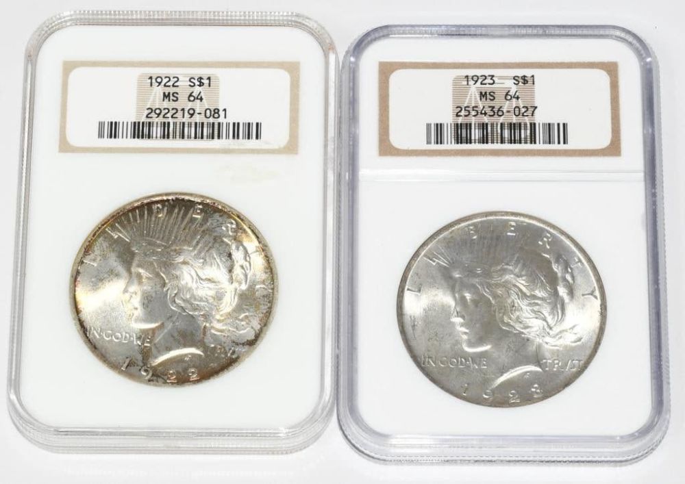 Lot 1340: 2 Graded Collector Liberty Peace Dollar Coins