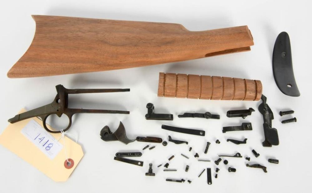Lot 1418: Winchester Slide Action Rifle Parts Lot